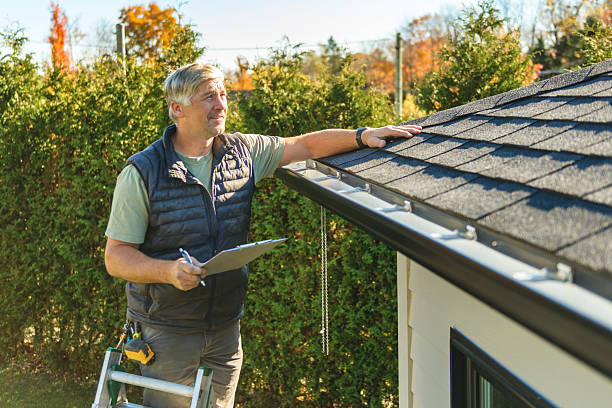 Professional Hail Damage Roof Repair technician working in Whitleyville, TN